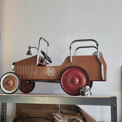 Lot 1398 - Vintage style Tin Plate pedal car in the form...