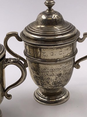 Lot 1057 - Three hallmarked silver presentation trophy...