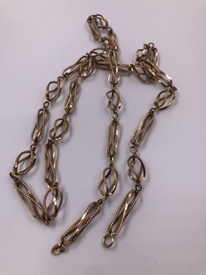 Lot 1011 - A 9ct hallmarked gold fancy link open-work...