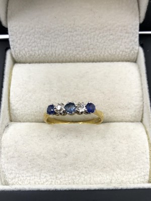 Lot 1004 - An 18ct hallmarked gold vintage sapphire and...