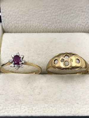 Lot 1016 - A 9ct, hallmarked gold ruby and diamond...