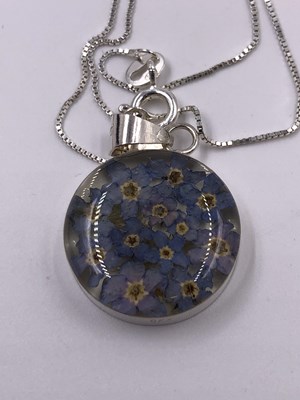 Lot 1016 - A 9ct, hallmarked gold ruby and diamond...