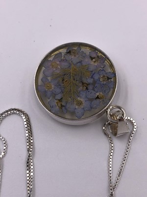 Lot 1016 - A 9ct, hallmarked gold ruby and diamond...