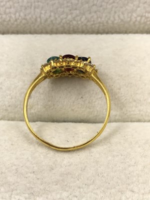 Lot 1031 - An unhallmarked gemset cluster ring, testing...