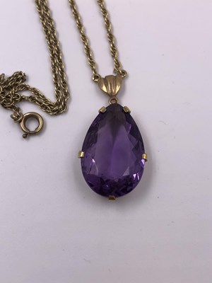 Lot 1036 - A vintage 9ct hallmarked gold gemset pendant...