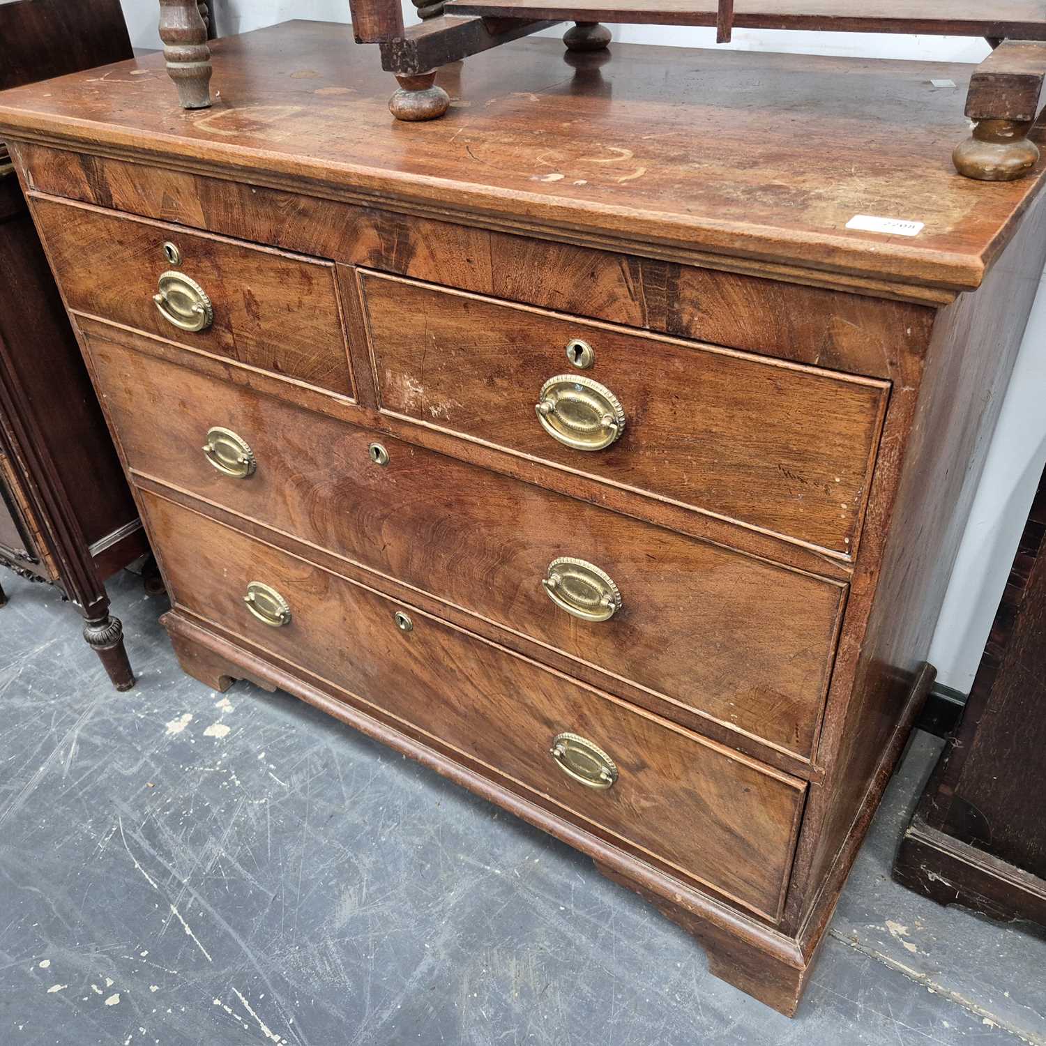Lot 2208 - A late Georgian mahogany small chest of Four...