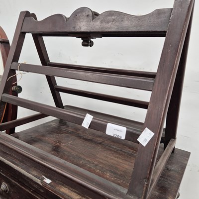 Lot 2209 - An antique reading stand together with a low...
