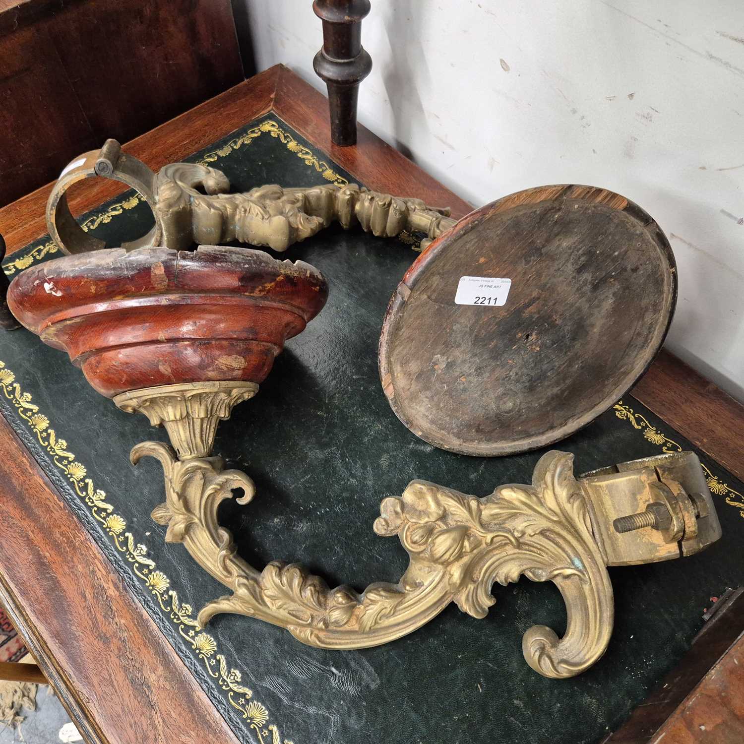 Lot 2211 - A pair of 19th-century gilded cast iron and...