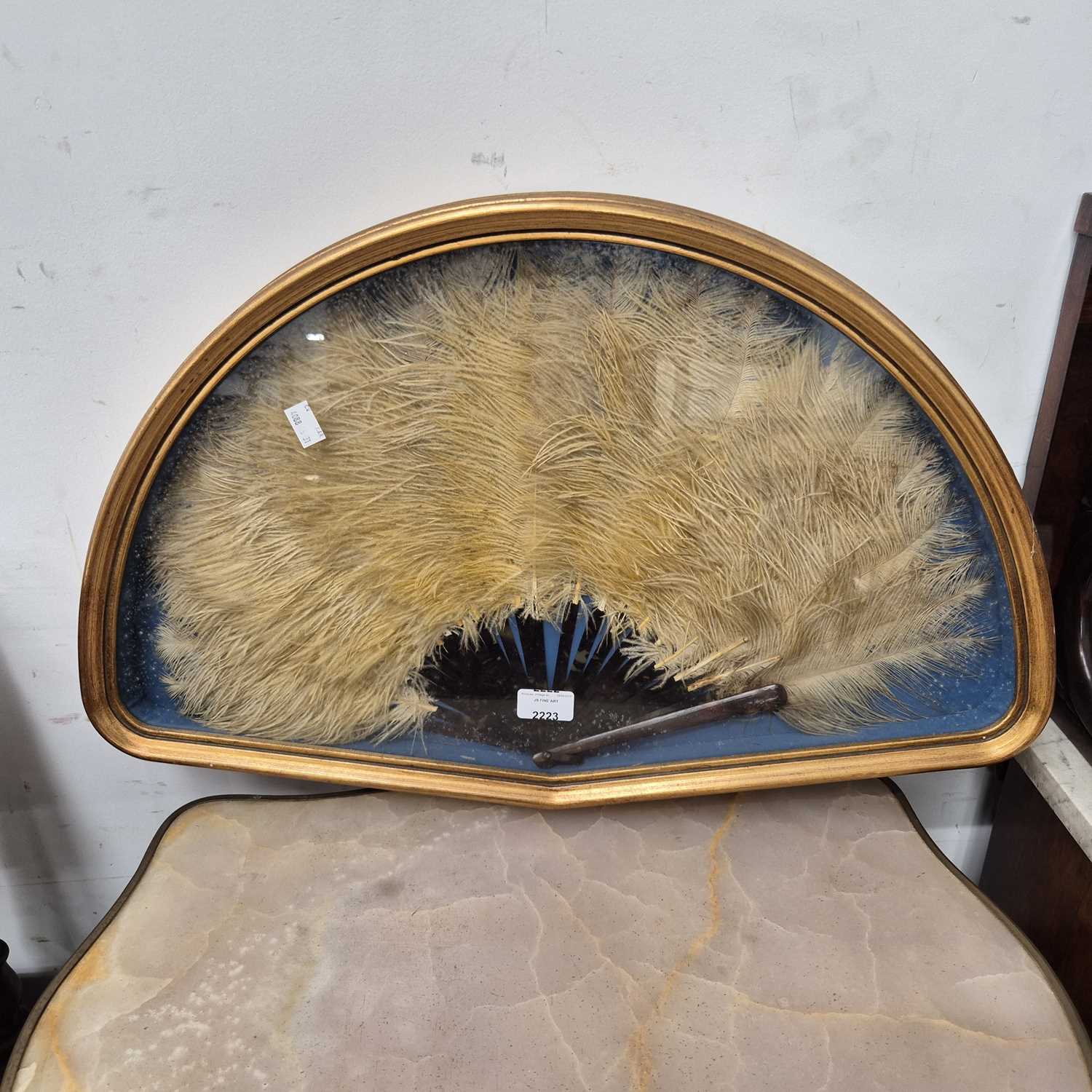 Lot 2223 - A giltwood cased early 20th century ostrich...