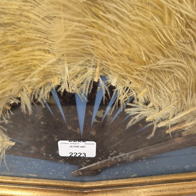 Lot 2223 - A giltwood cased early 20th century ostrich...