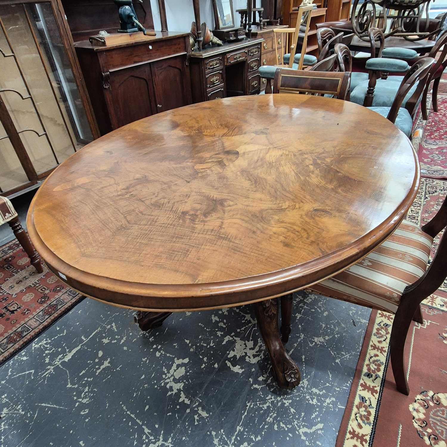 Lot 2230 - A Victorian walnut breakfast table with an...
