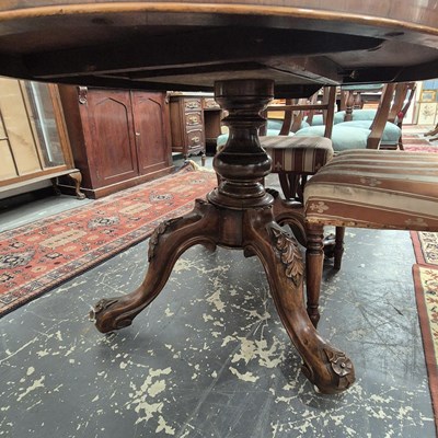 Lot 2230 - A Victorian walnut breakfast table with an...