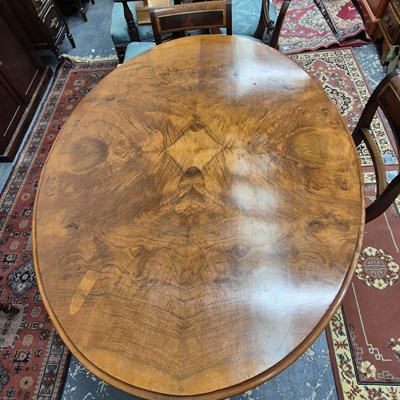 Lot 2230 - A Victorian walnut breakfast table with an...