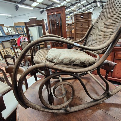 Lot 2231 - An antique Bentwood framed rocking chair with...