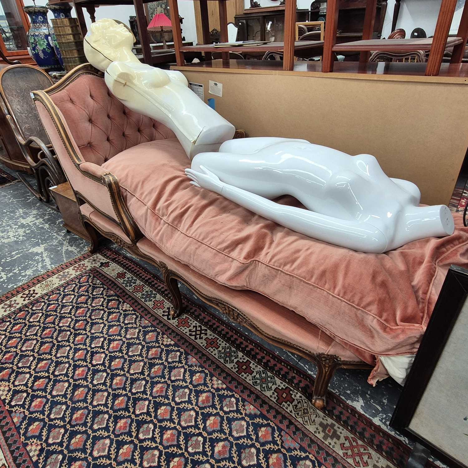 Lot 2252 - A French showframe chaise lounge.