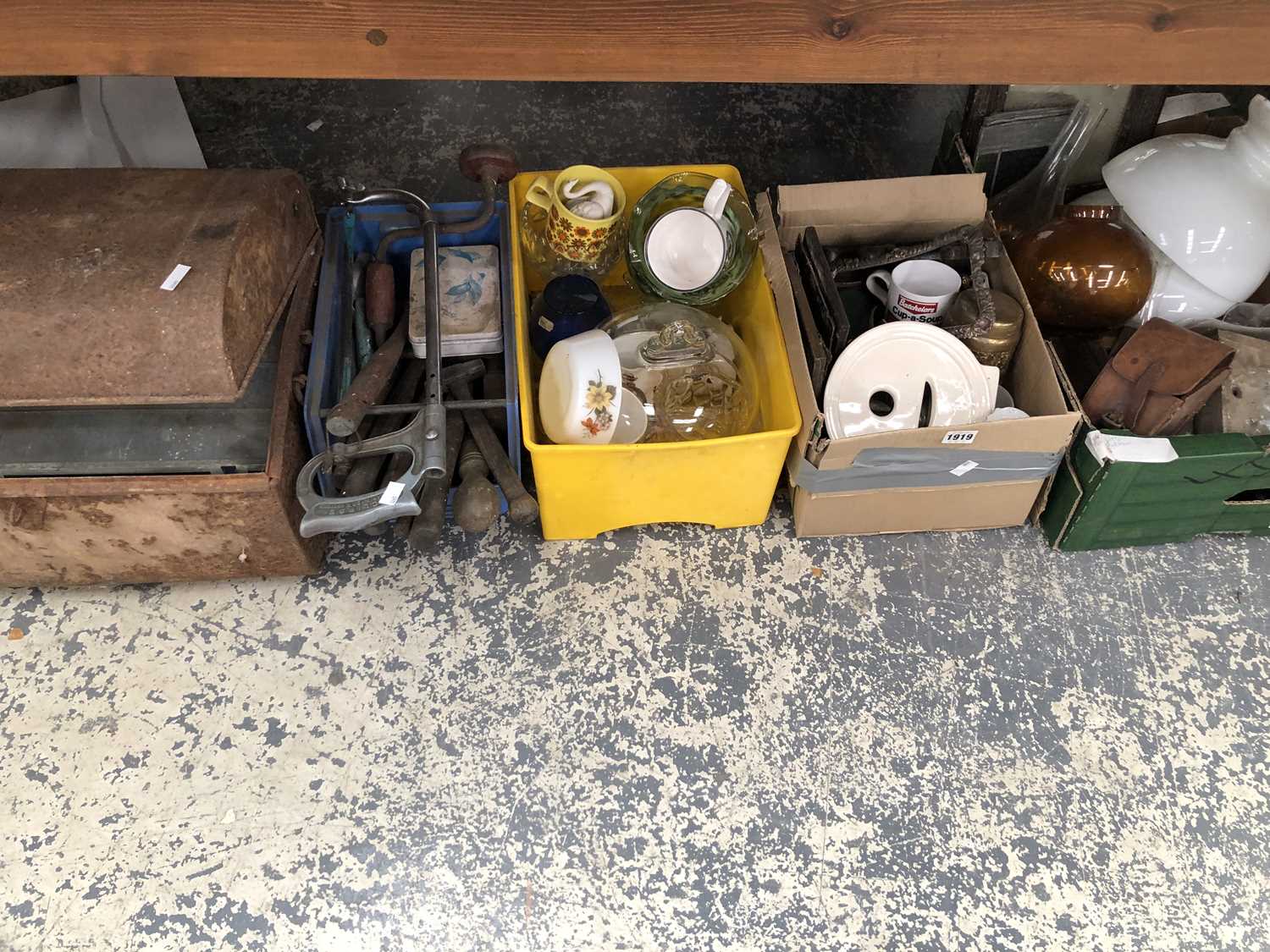 Lot 1919 - A metal chest, tools, a glass cheese bell,...