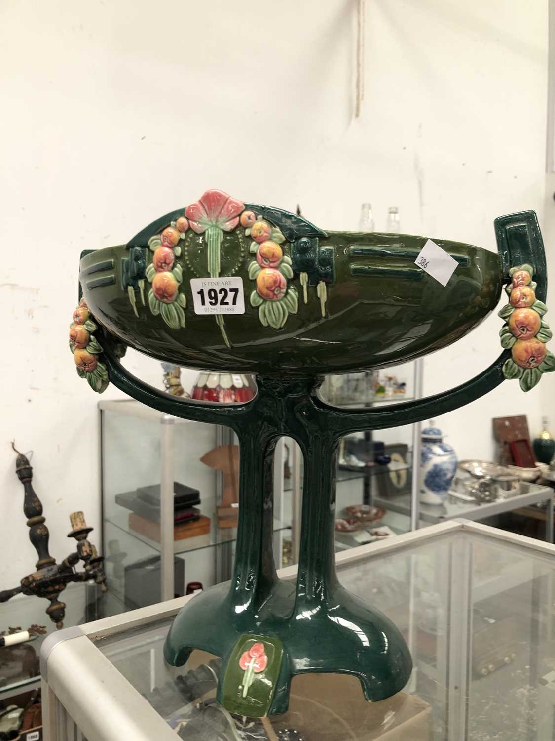 Lot 1927 - An Eichwald green ground two handled standing...