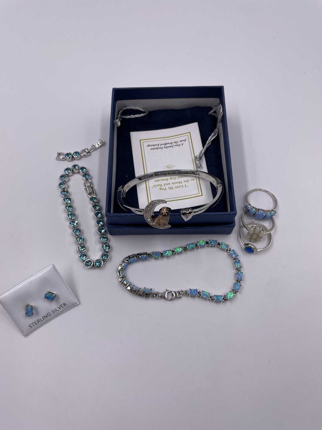 Lot 1060 - A Bradford Exchange "I love my pug" bangle,...