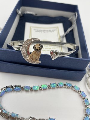 Lot 1060 - A Bradford Exchange "I love my pug" bangle,...