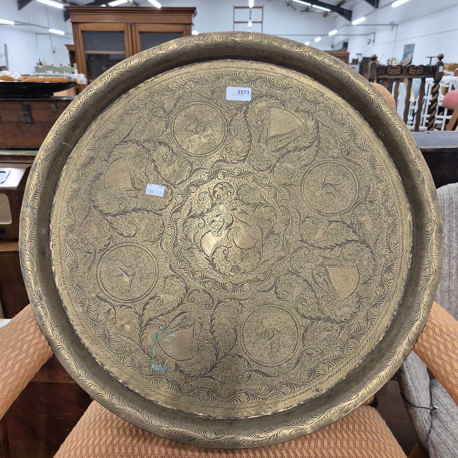 Lot 2273 - A good quality eastern brass engraved drinks...