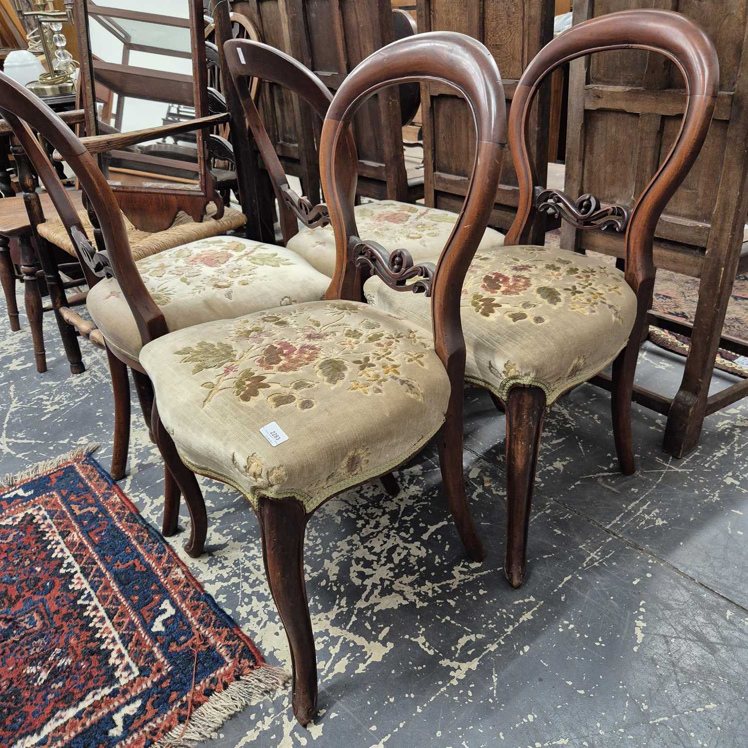 Lot 2283 - A set of four Victorian balloon-back dining...