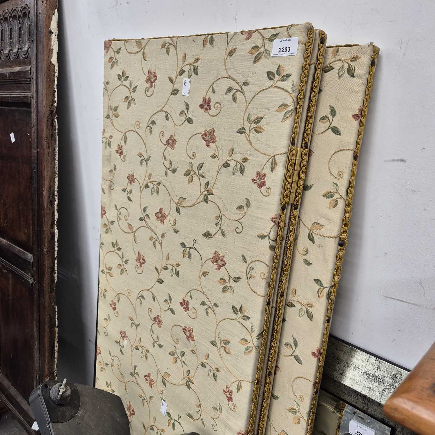 Lot 2293 - A fabric-covered three-fold screen.