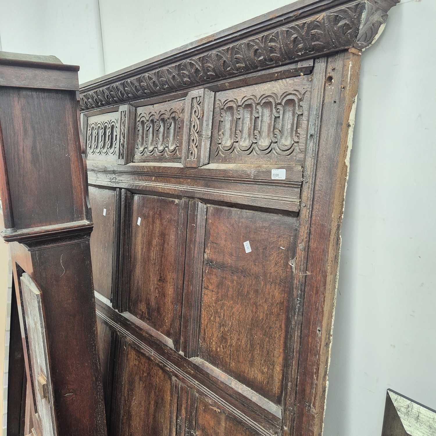 Lot 2320 - A large early 18th-century oak wall panel. H...