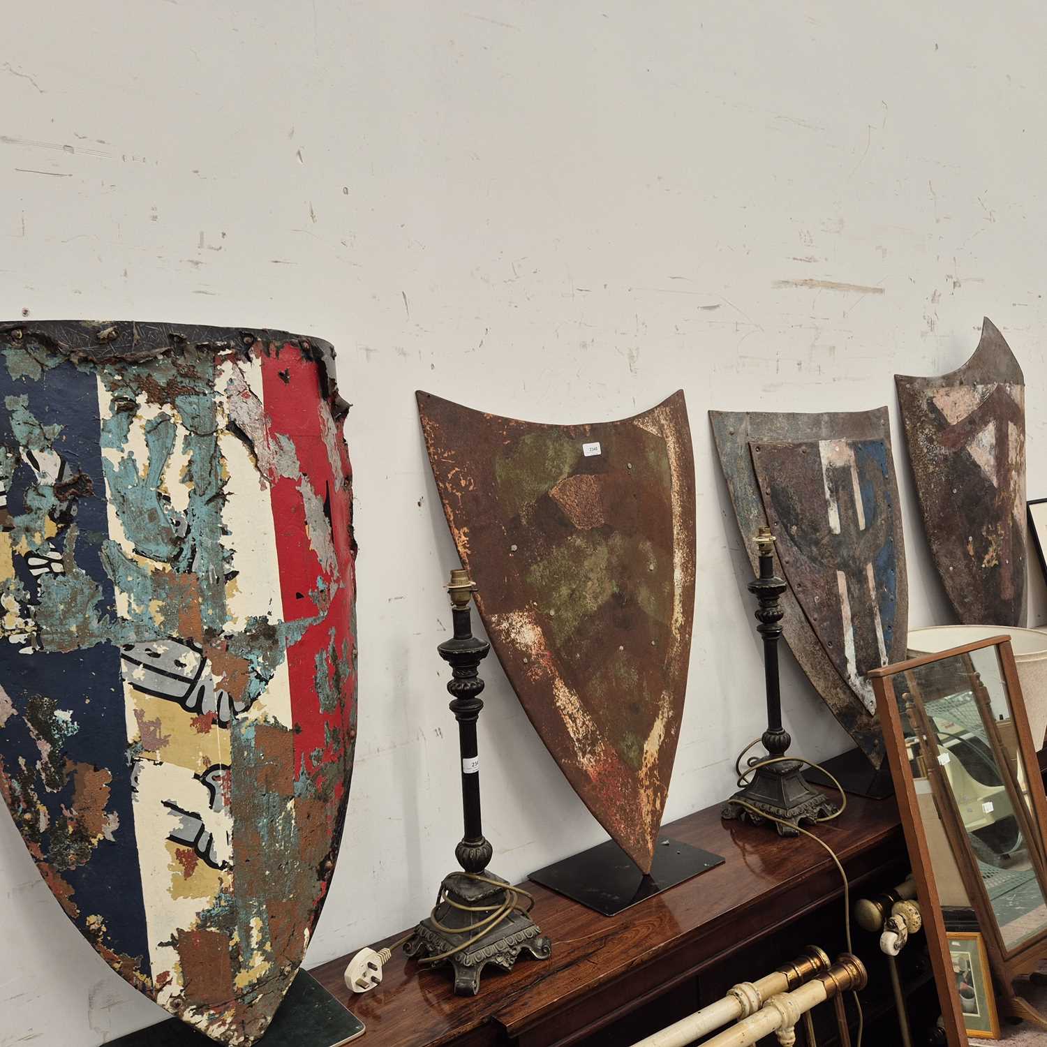 Lot 2348 - Four large ornamental battle shields. Prov....