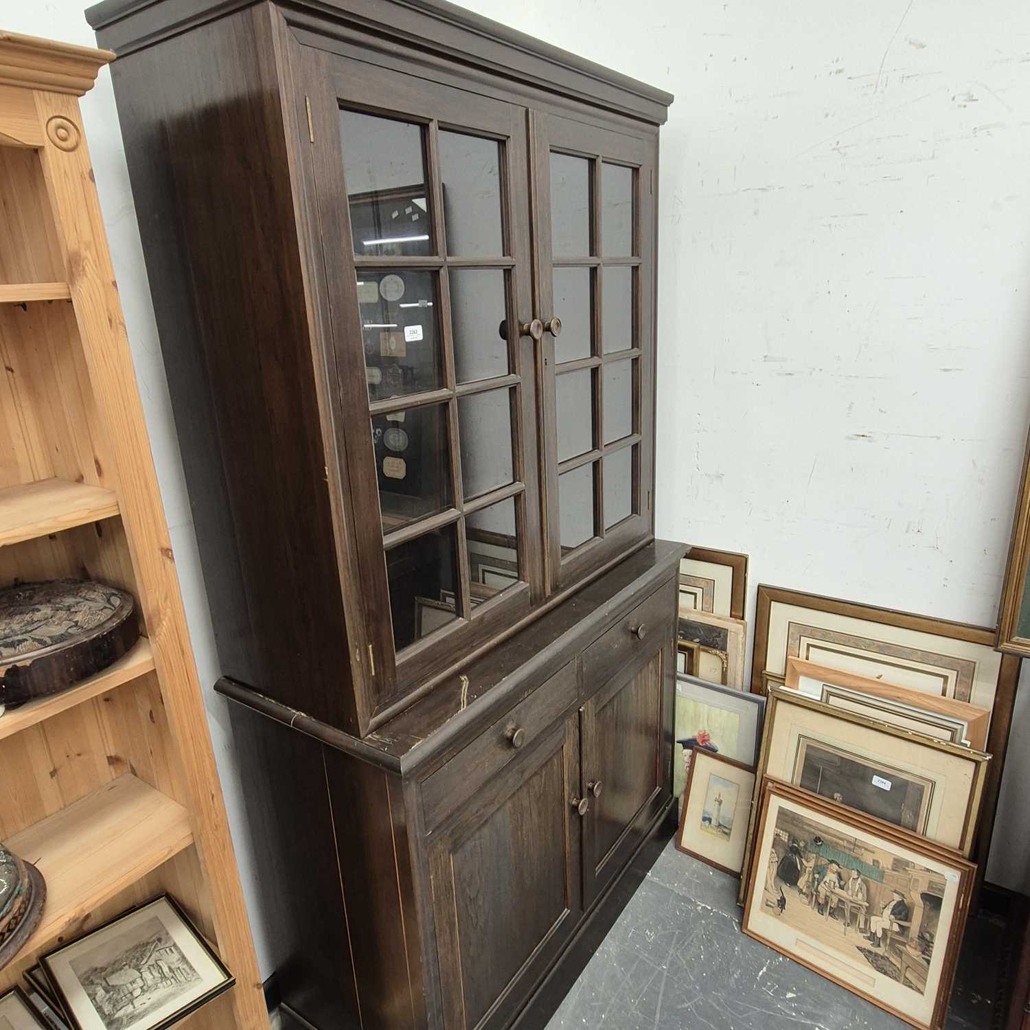 Lot 2363 - An antique glazed oak side cabinet.