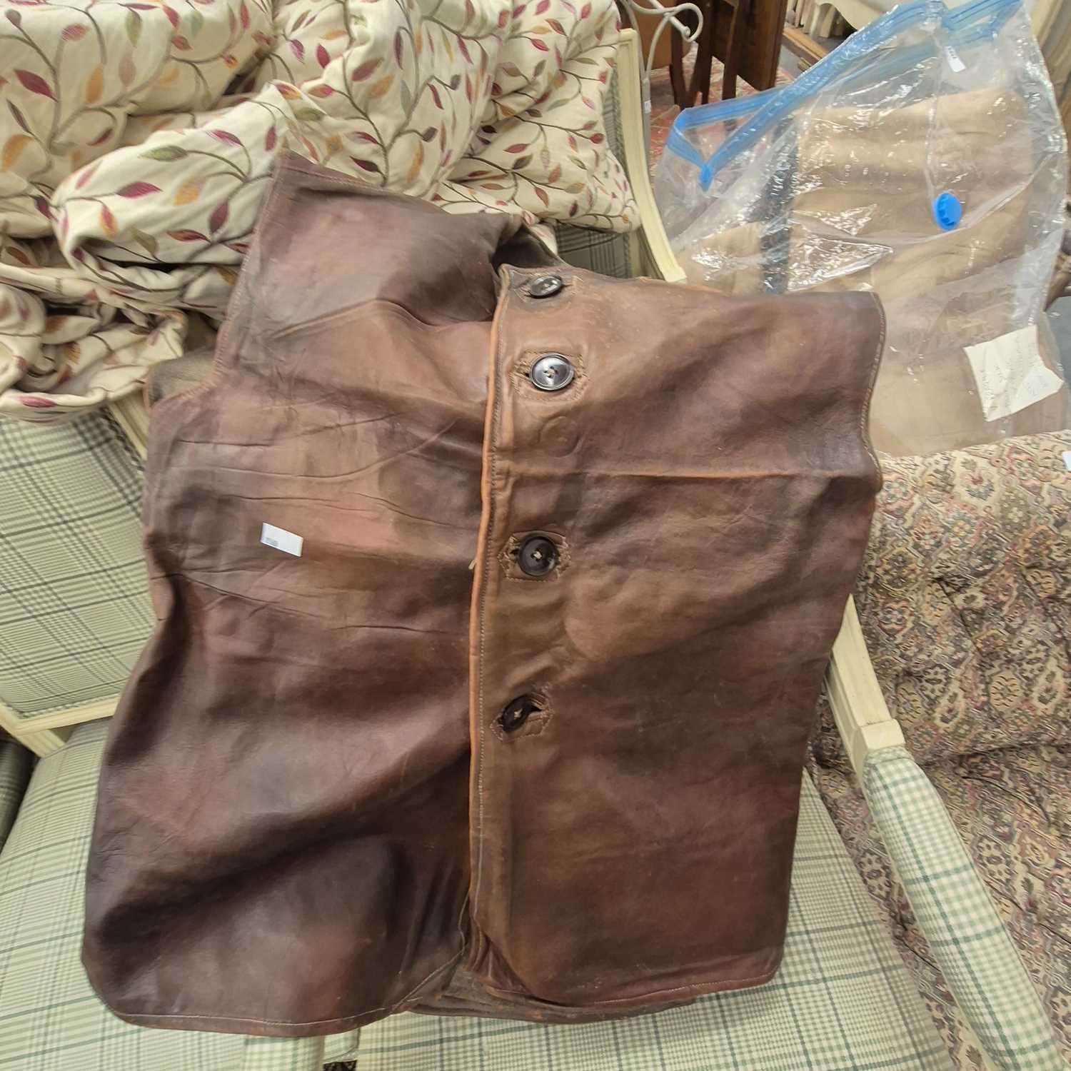 Lot 2523 - Two military leather jerkins, no.2, dated 1944...