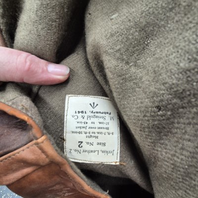 Lot 2523 - Two military leather jerkins, no.2, dated 1944...