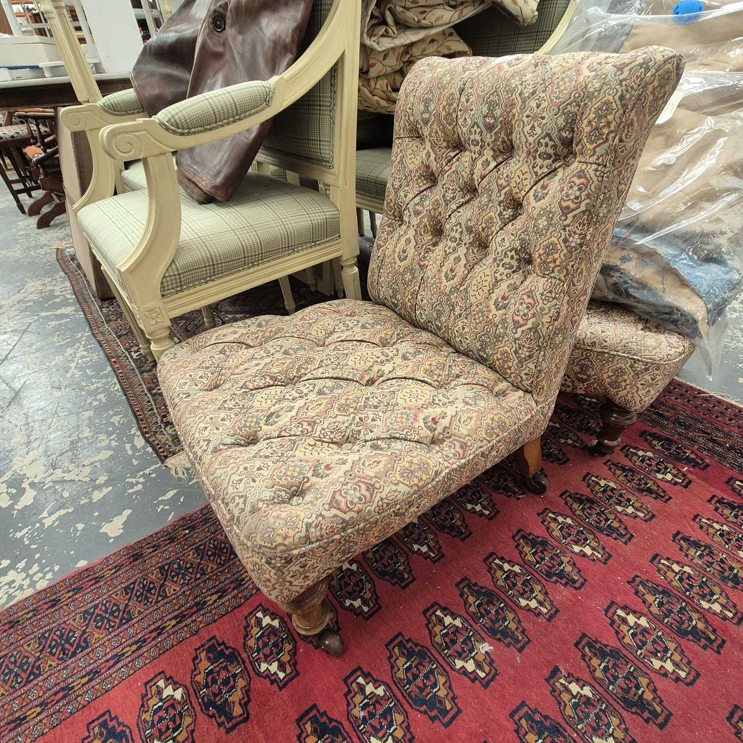 Lot 2524 - A pair of Victorian button-back nursing chairs.