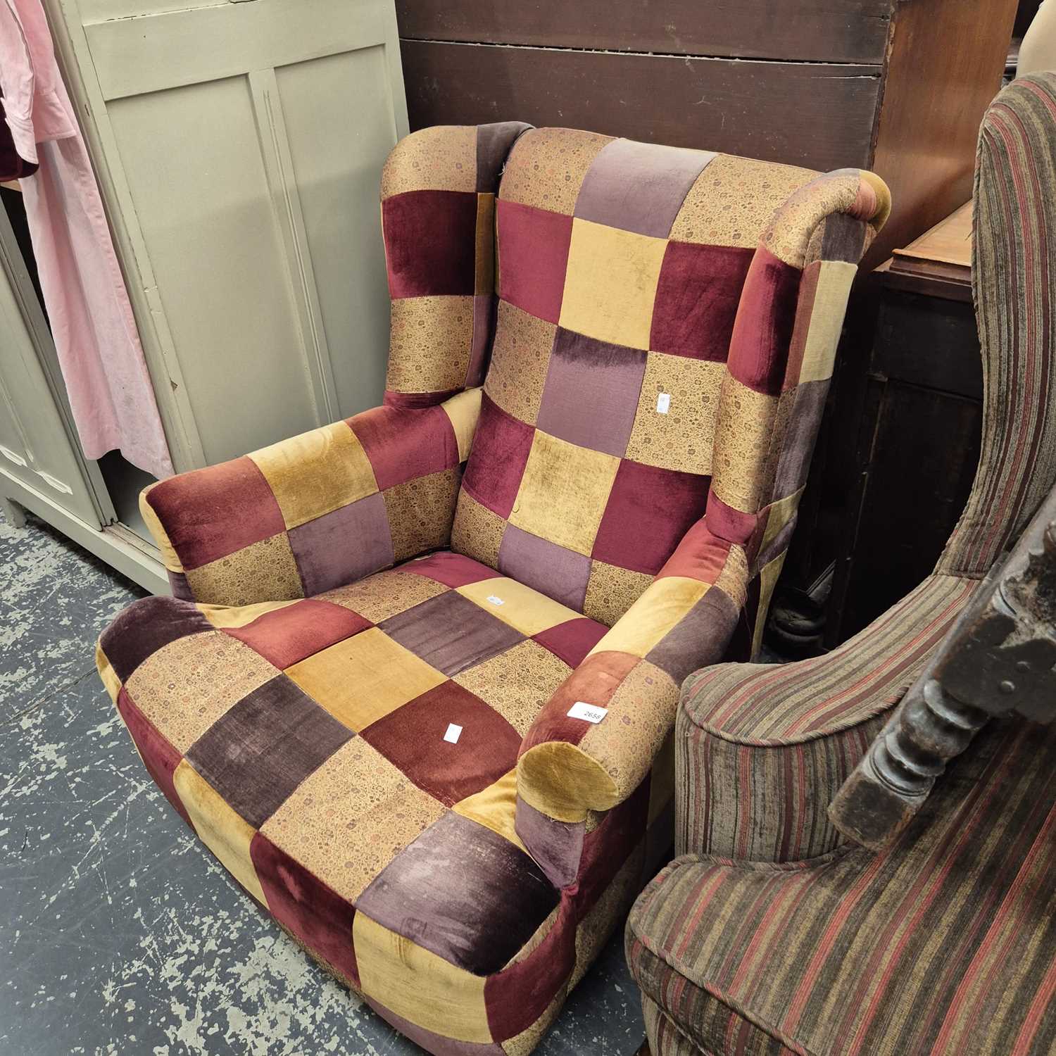 Lot 2658 - A patchwork upholstered Victorian armchair.