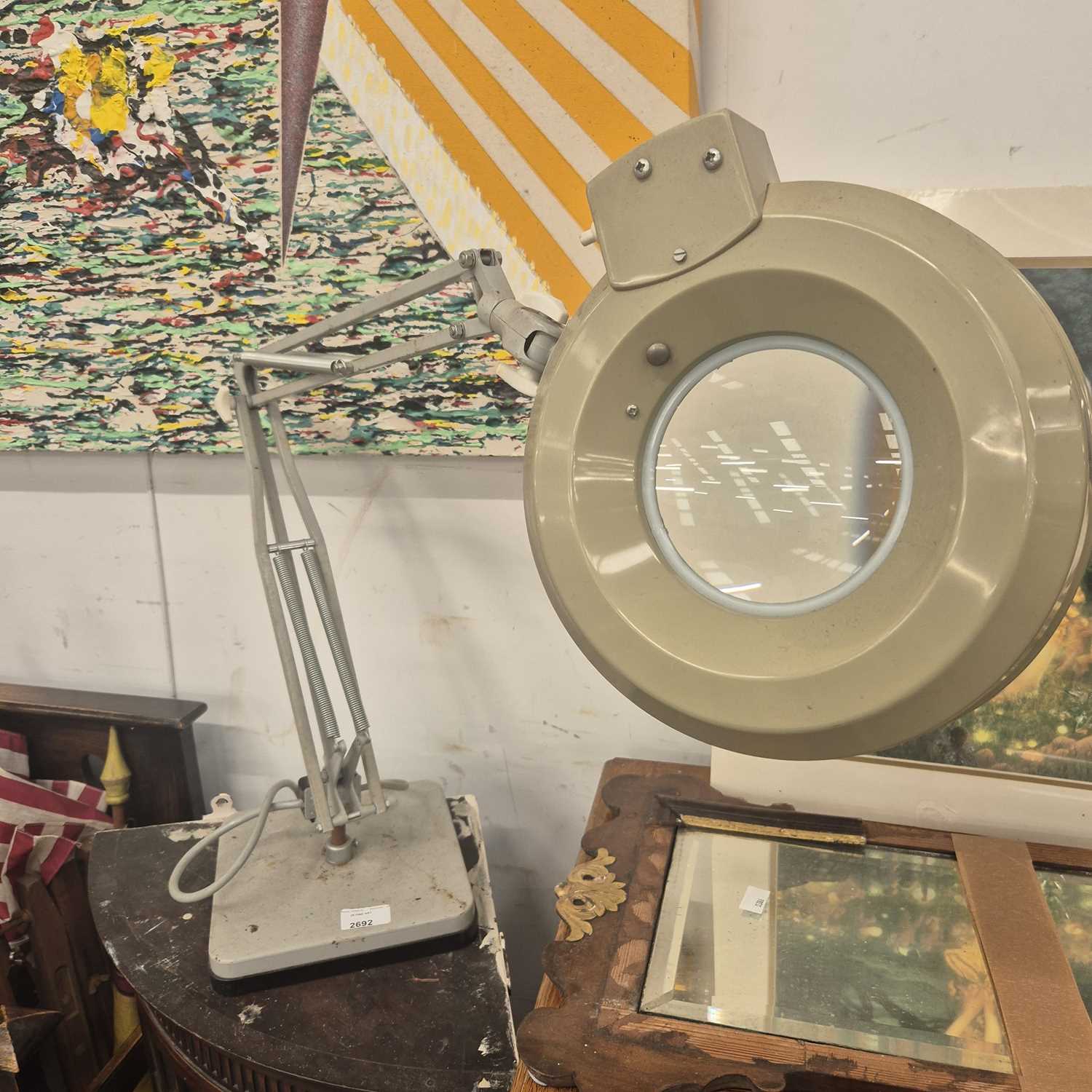 Lot 2692 - An angle-poise magnifying lamp.
