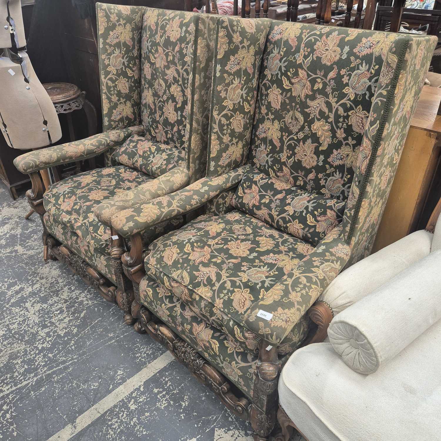 Lot 2698 - A pair of Jacobean-style wing armchairs.