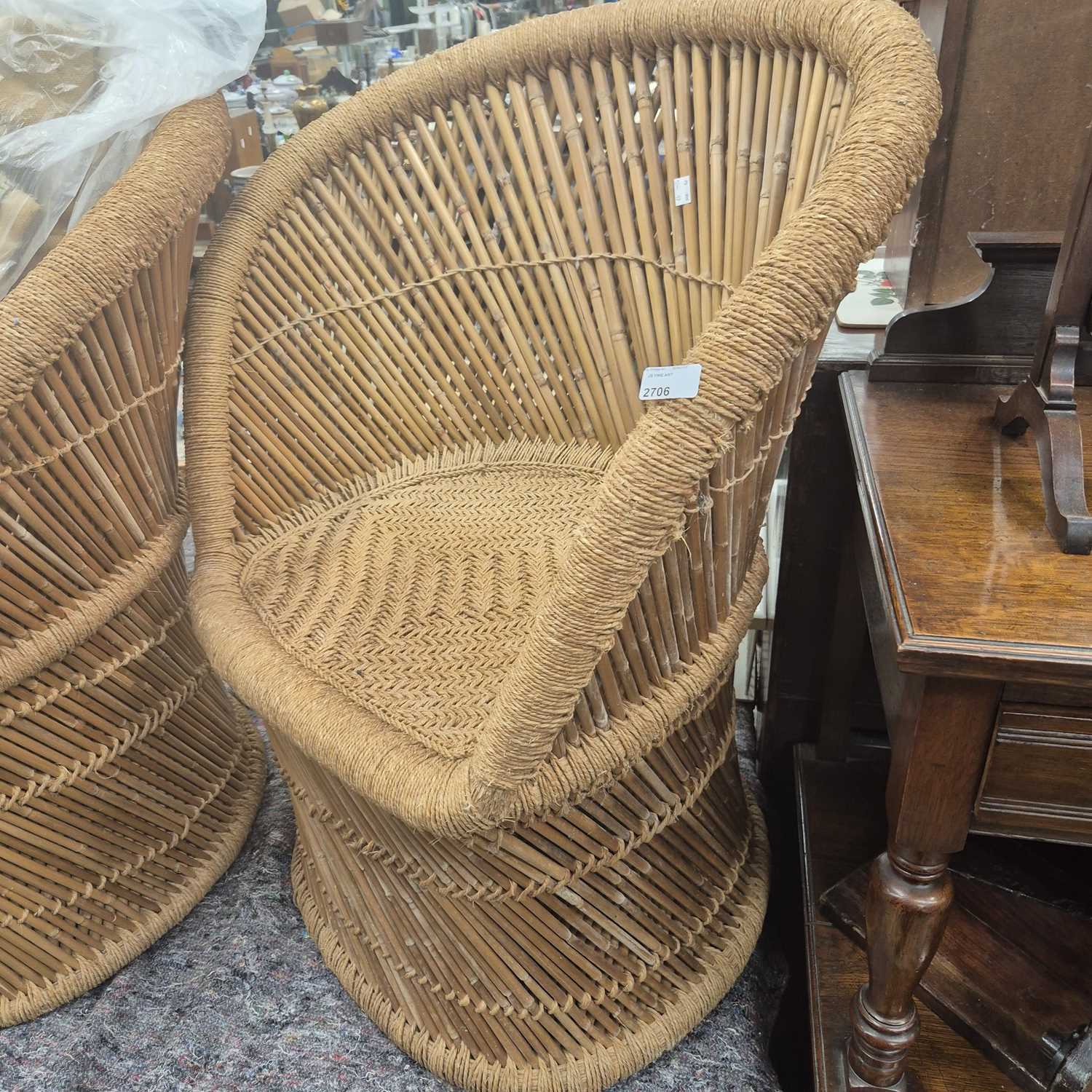 Lot 2706 - A pair of bamboo conservatory chairs.