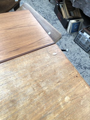 Lot 2744 - A large retro teak dining table.