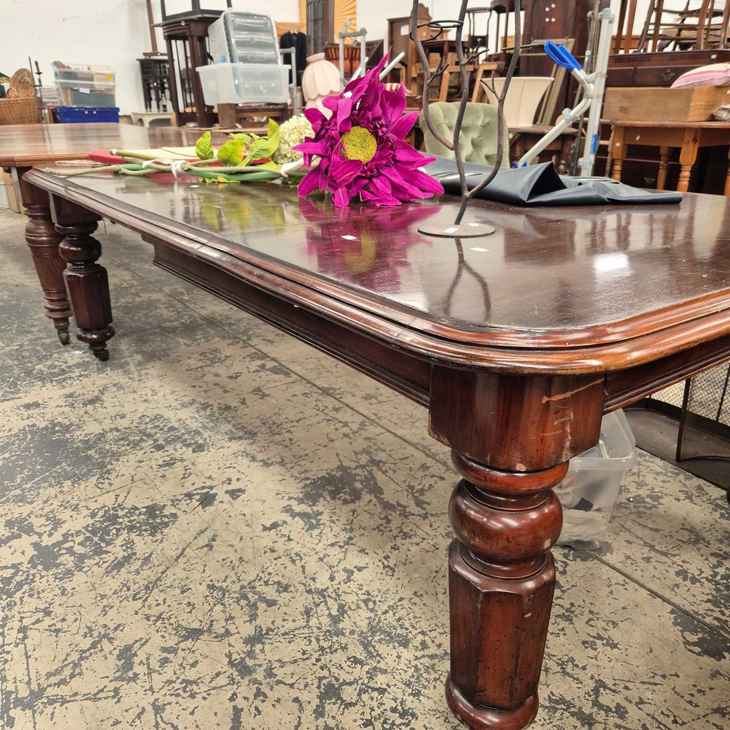Lot 2755 - A Victorian mahogany dining table. H 71 x W...