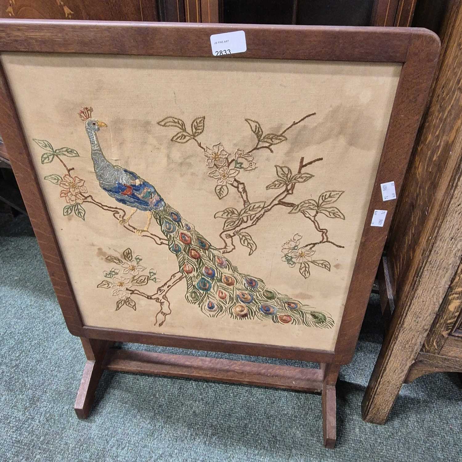 Lot 2833 - A firescreen with a foldover top.