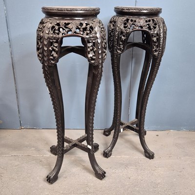 Lot 209 - A pair of Chinese marble topped pierced and...