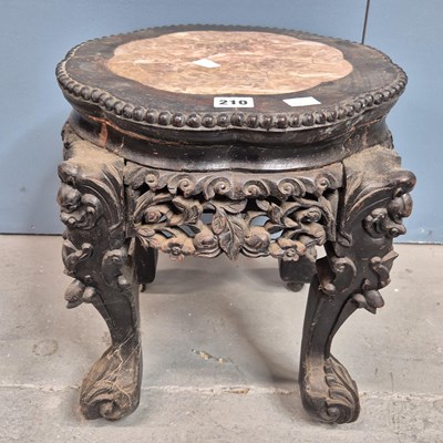 Lot 210 - A Chinese marble topped hardwood stand, the...