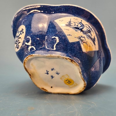 Lot 212 - A Bow powder blue ground sauce boat and cover...