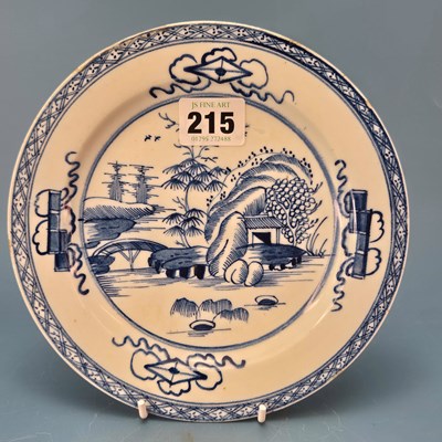 Lot 215 - A Bow blue and white plate painted with a...
