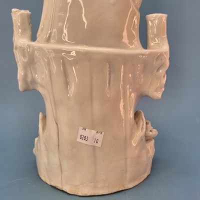 Lot 233 - A blanc de Chine figure of Guanyin seated...