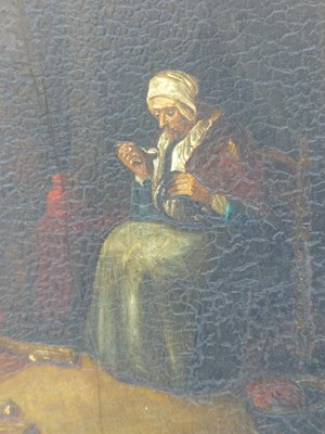 Lot 35 - 18th century Dutch school. Woman by the...