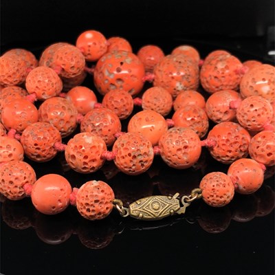 Lot 2 - A vintage graduated necklace of coral beads....