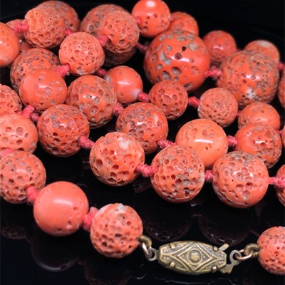 Lot 2 - A vintage graduated necklace of coral beads....