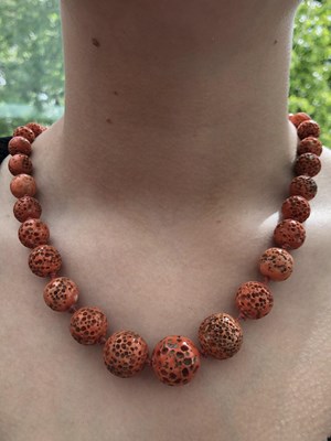 Lot 2 - A vintage graduated necklace of coral beads....