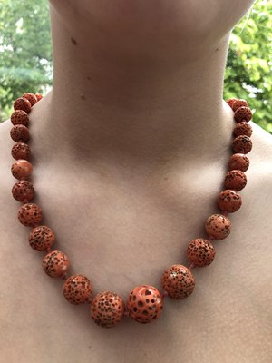Lot 2 - A vintage graduated necklace of coral beads....