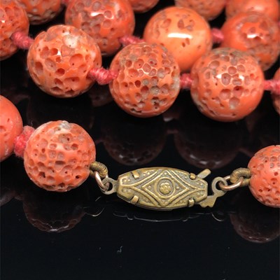 Lot 2 - A vintage graduated necklace of coral beads....